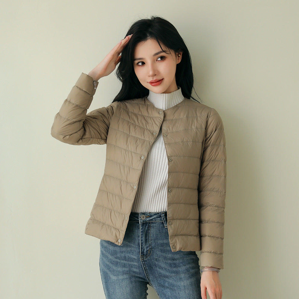 Women's lightweight white duck down jacket with quilted design and hood