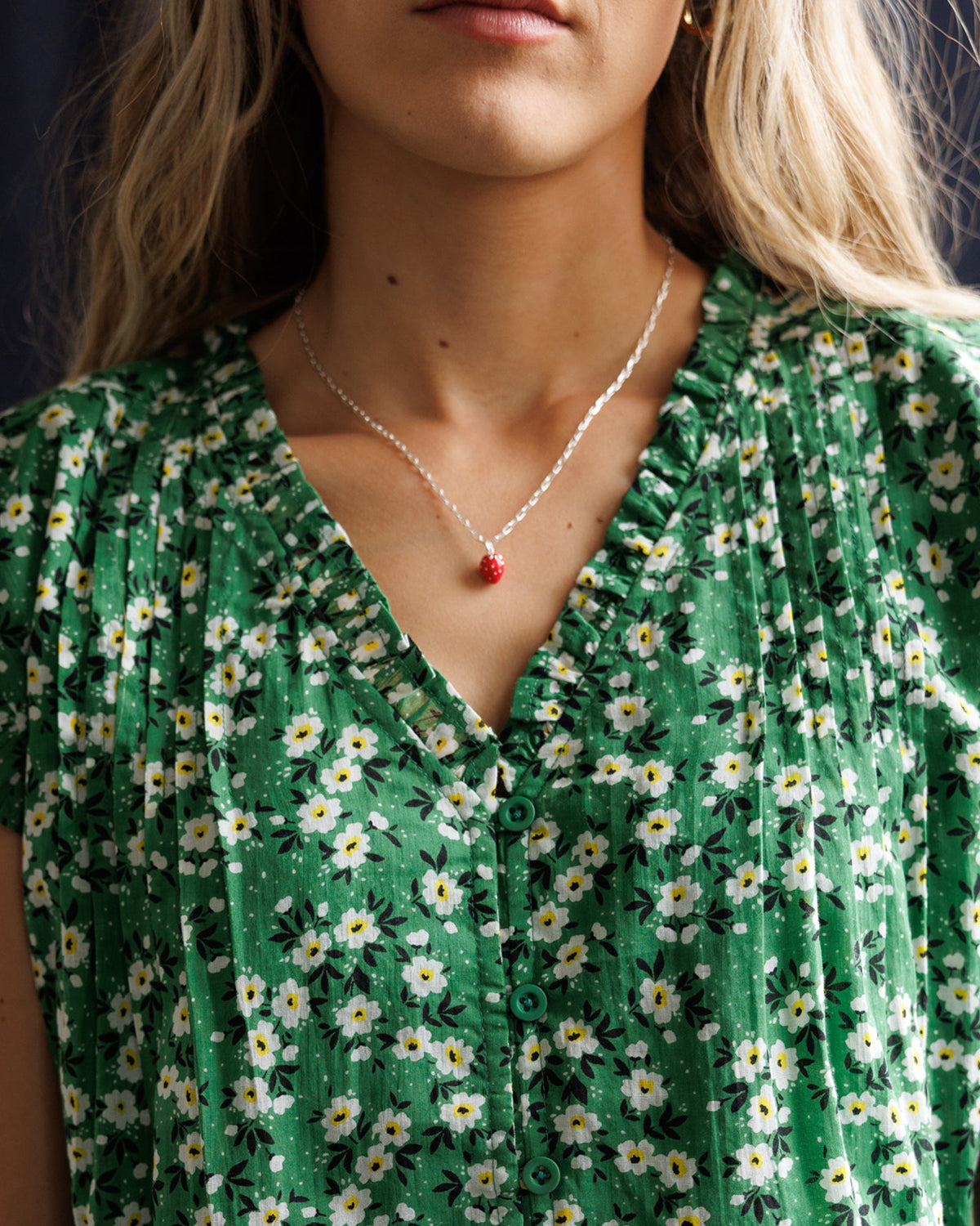 Silver Strawberry Fields Forever necklace by Downeast featuring a delicate strawberry charm on a fine chain.