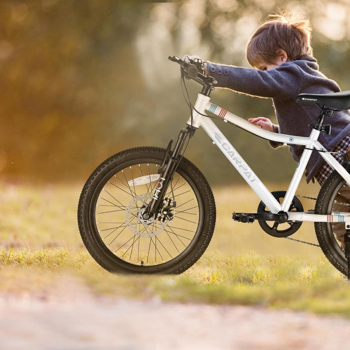 20-inch GBruno Store kids mountain bike with 7-speed gears and front suspension, featuring a sturdy frame and colorful design.