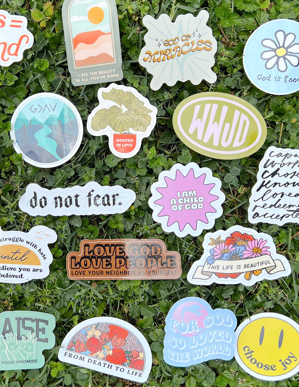 Assorted Christian stickers featuring inspiring designs and quotes, ideal for decorating notebooks, laptops, or water bottles.