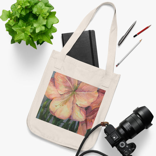 Organic canvas tote bag featuring original 'Amaryllis' artwork by Barbara Cleary, showcasing vibrant floral design.