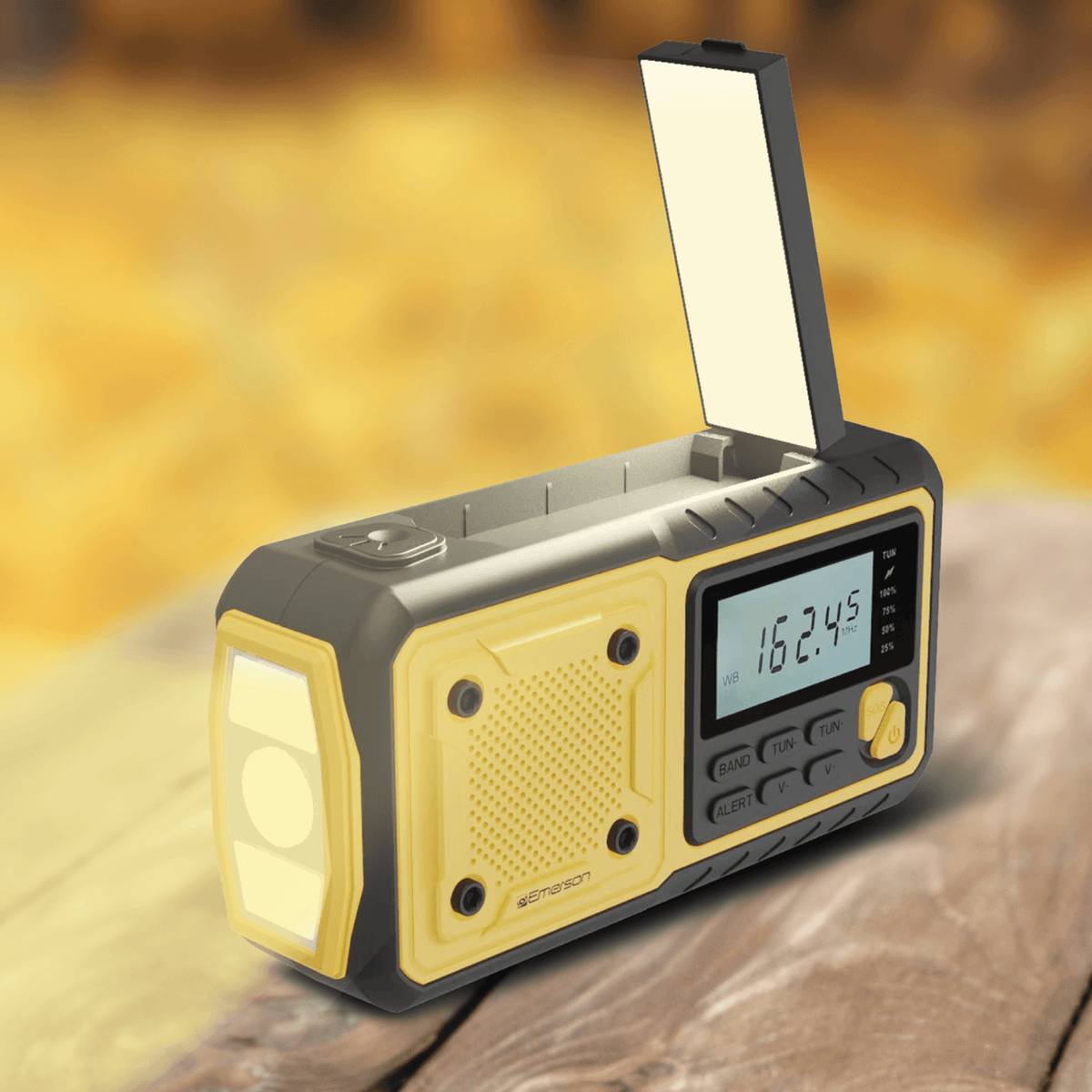 Emerson emergency AM/FM radio with weather band, built-in flashlight, and power bank, featuring a portable design and control buttons.
