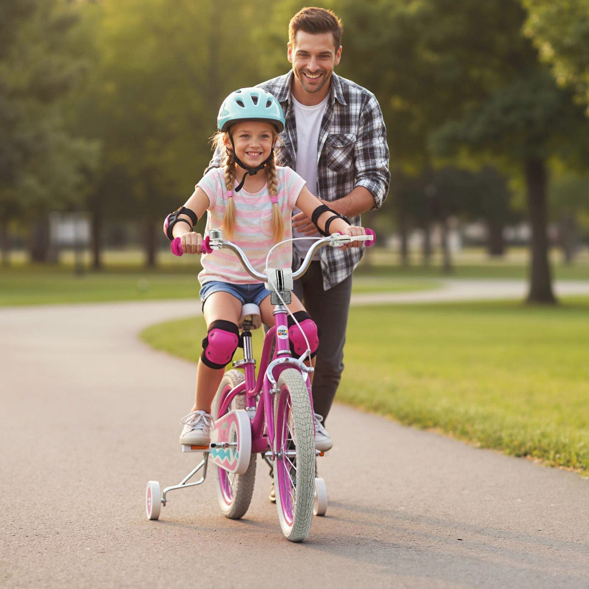 Pink kids bike with 12-18 inch wheels and training wheels, designed for young children, featuring a sturdy frame and colorful accents.