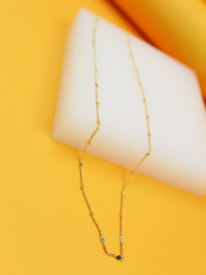 Beaded cable chain necklace by MIA Jewelry featuring small round beads on a silver-tone chain for a stylish look.