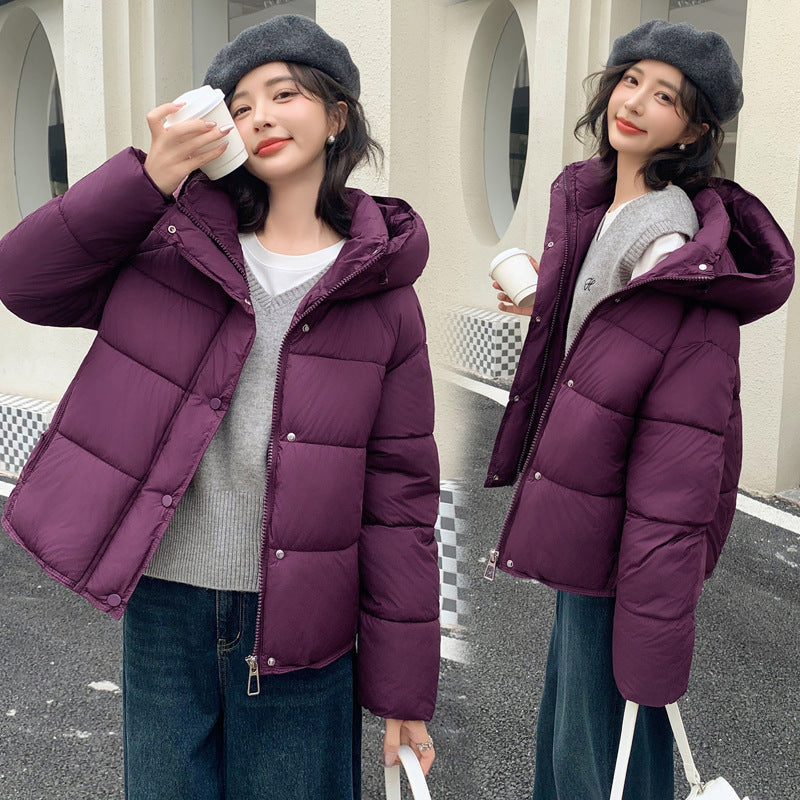 Women's stylish short down puffer coat in a sleek design, front view