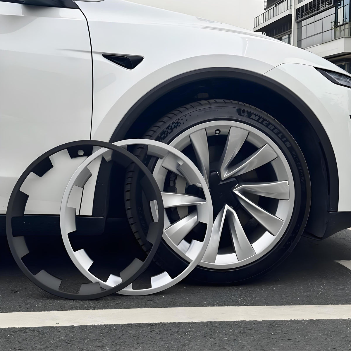Set of four 20-inch wheel rim protectors for Tesla Model Y Juniper, designed to shield wheels from damage and enhance appearance.