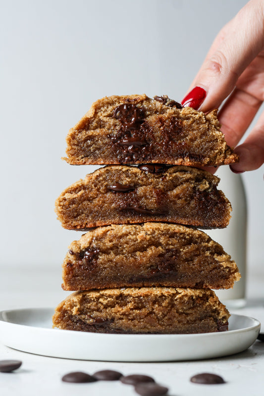 Vegan chocolate chip cookies from Sweet Addison's with visible chocolate chips on a baking sheet.