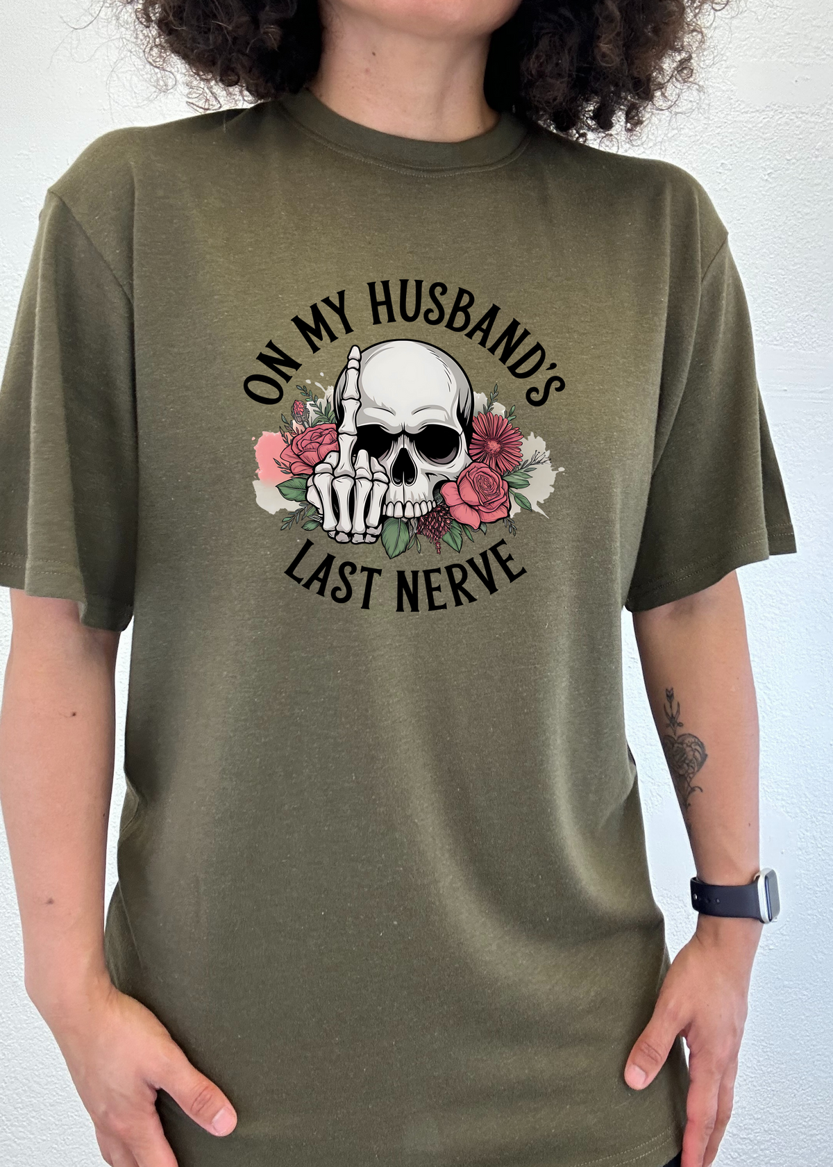 Unisex bamboo cotton graphic T-shirt with playful "On My Husband's Last Nerve" print from Spun Bamboo, casual men's apparel.