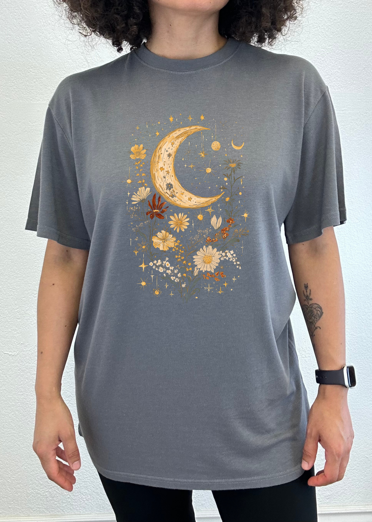 Unisex bamboo cotton T-shirt featuring celestial moon, boho flowers, vintage design, by Spun Bamboo, with printed graphic on front.