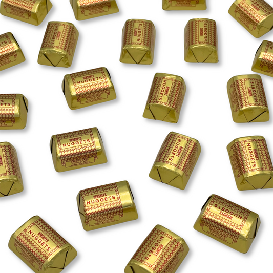 Hershey's Nuggets Special Dark chocolate with almonds in a bulk Candy In Bulk package, featuring bite-sized dark chocolate pieces with almonds.
