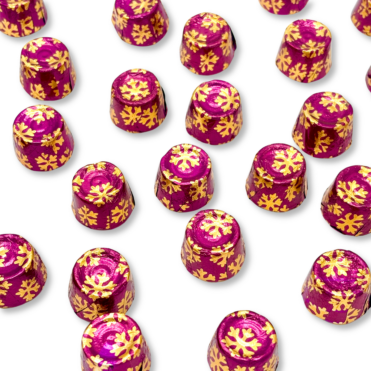 Dark chocolate Rolo salted caramel candies wrapped in festive Christmas foil, bulk value bag from Candy In Bulk.