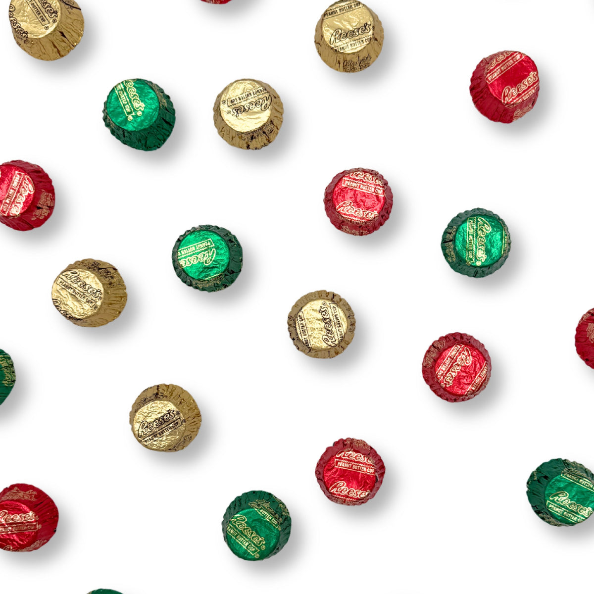 Two Reese's Miniature Milk Chocolate and Peanut Butter Cups in Christmas foil wrappers from Candy In Bulk.