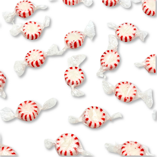 Two peppermint hard candies from Candy In Bulk Starlight Peppermint collection in a clear bag.