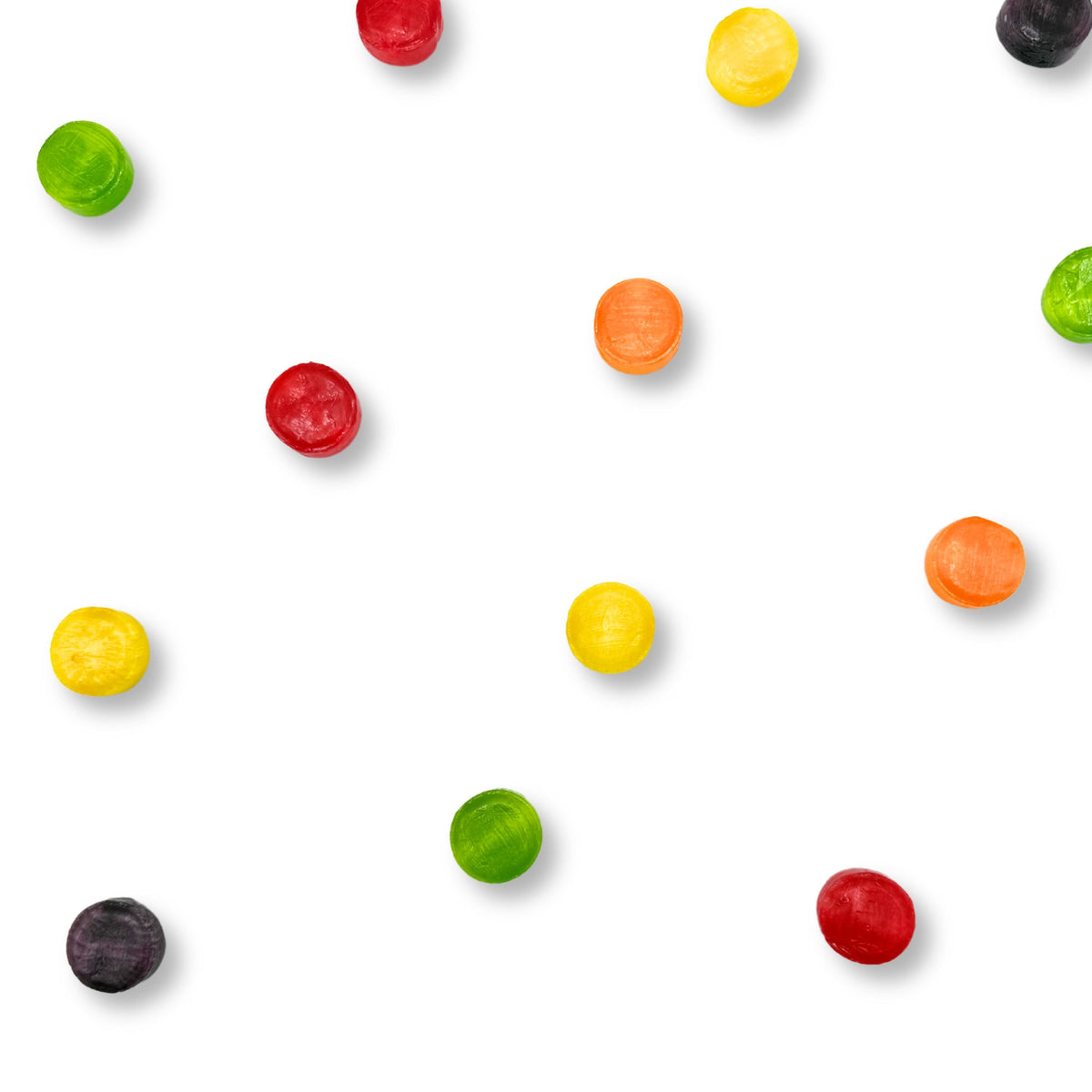 Assorted fruit-flavored hard candies in a bulk value bag from Candy In Bulk, colorful fruit-shaped candy buttons.