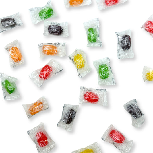 Assorted flavor Candy In Bulk Roses Brands hard candy barrels in a bulk value bag, colorful candies with shiny wrappers.