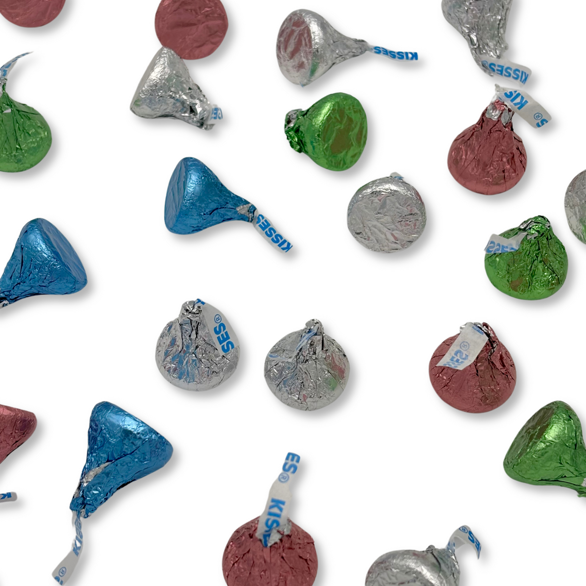 Two Hershey's Kisses Milk Chocolate Easter foils from Candy In Bulk, showing shiny silver wrapping in a bulk value bag.