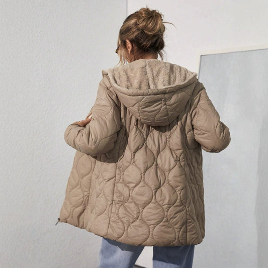 Women's mid-length hooded padded coat with fleece lining in a quilted design