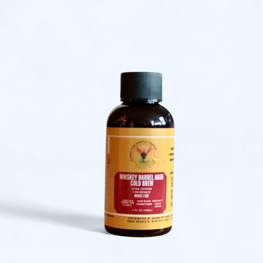 2oz Rising For People Coffee Co. whiskey barrel cold brew concentrate in small travel-sized bottle, ready to enhance coffee drinks.