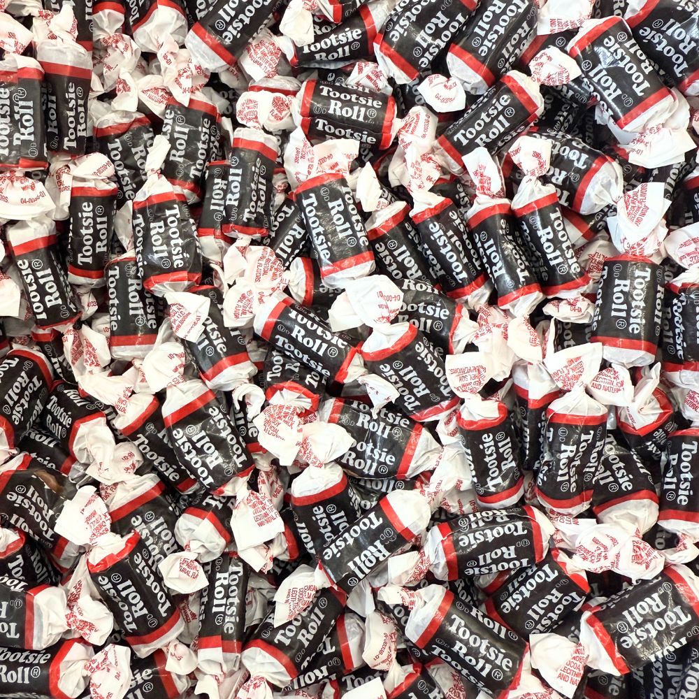 Assorted Tootsie Roll Midgees chewy candy in a bulk value bag from Candy In Bulk, showing colorful individual candies.