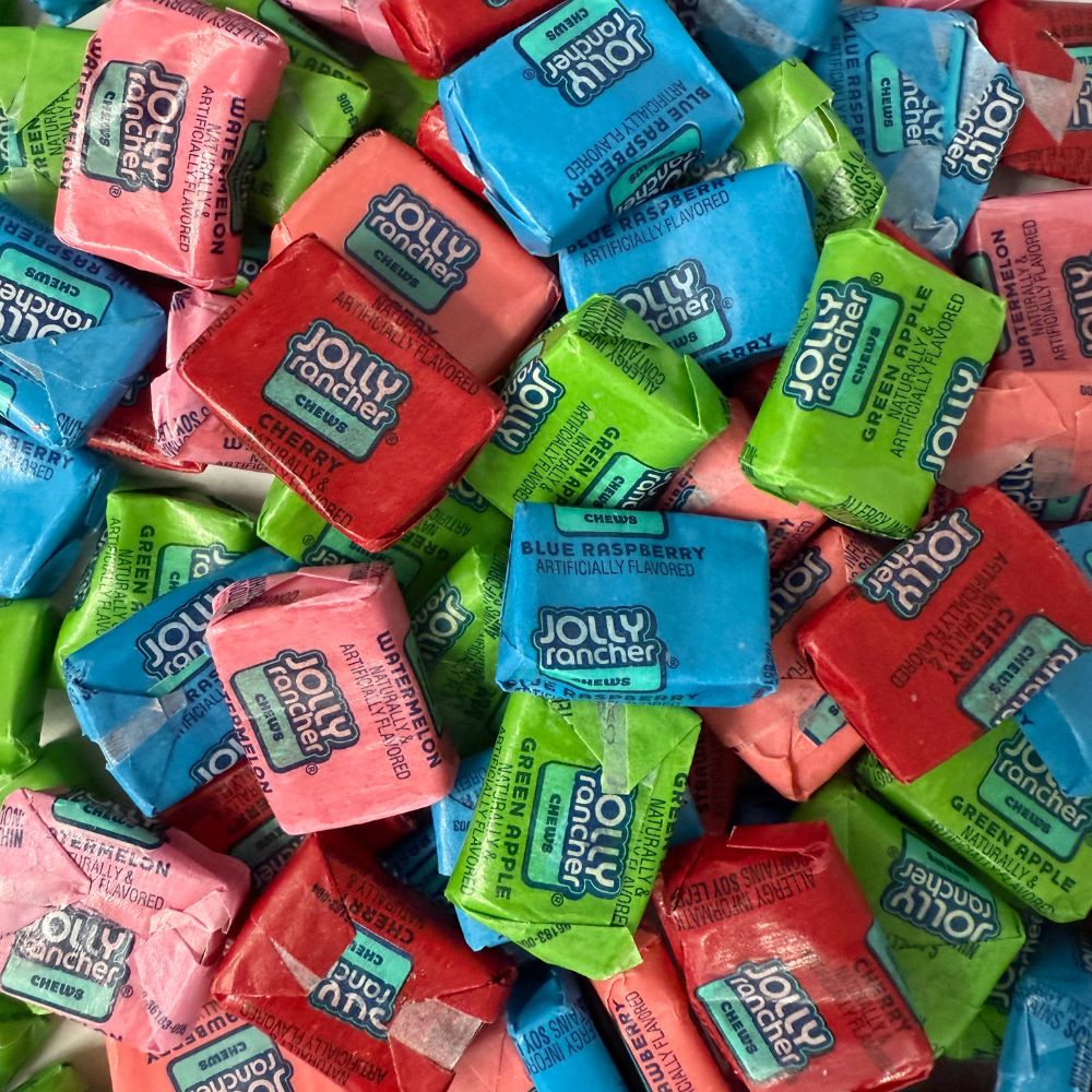 Assorted Jolly Rancher Fruit Chews by Candy In Bulk, colorful chewy candies with fruity flavors on a white background.