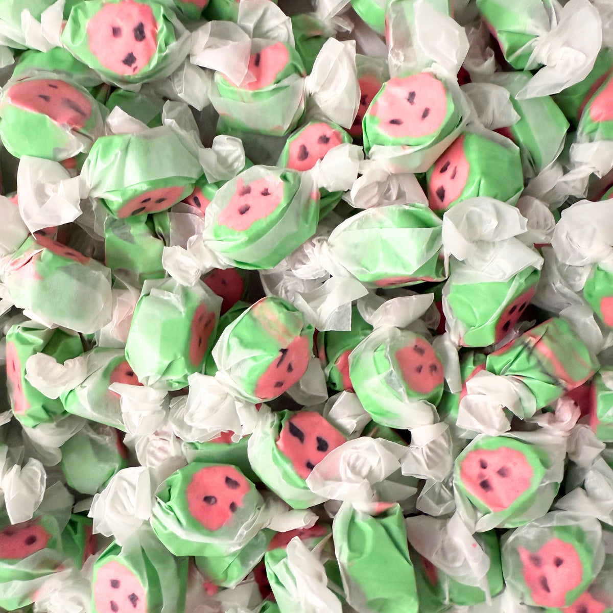 Watermelon salt water taffy candy from Candy In Bulk in a large value bag, soft and chewy with vibrant watermelon flavor.
