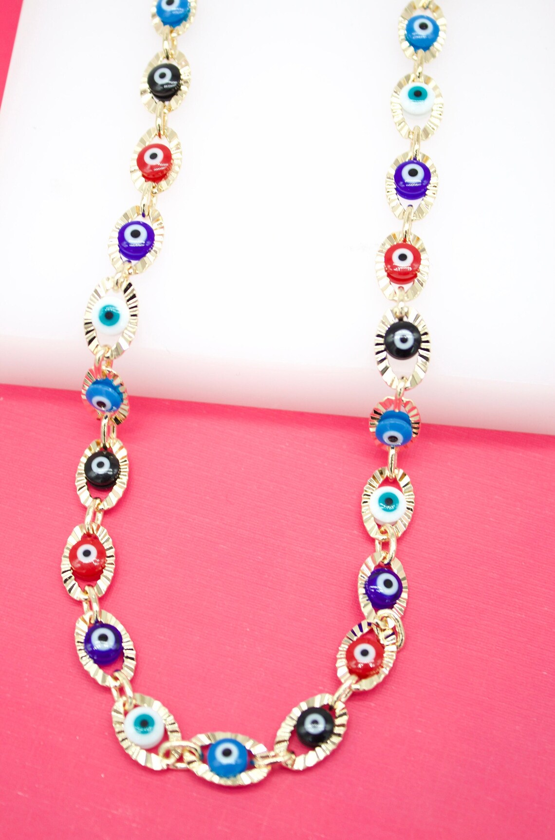 Large multi-color evil eye bracelet by MIA Jewelry featuring vibrant beads and protective evil eye charms.