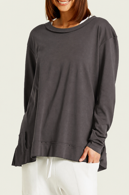 Model wearing PLANET by Lauren G Pima Cotton Detail Tee in Lava, showcasing the soft fabric and relaxed fit of the T-shirt.