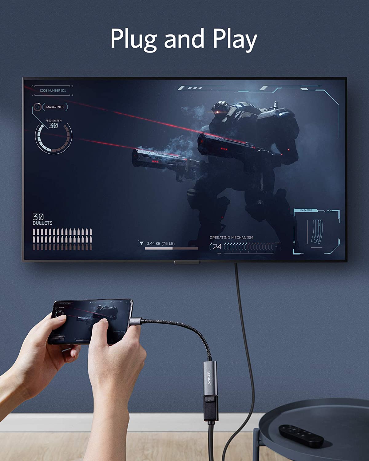 Anker PowerExpand USB-C to DisplayPort adapter connected to a laptop, showing the compact black adapter with cable attached.