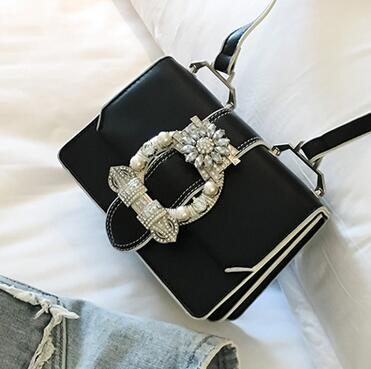 Elegant women's designer diamond lock handbag in PU leather by BACKUPMYFILESNOW® with a stylish, modern design.