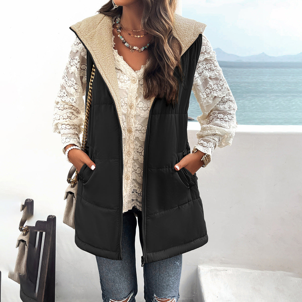 Women's mid-length hooded cotton winter vest with pockets, zipper, and fluffy warm lining