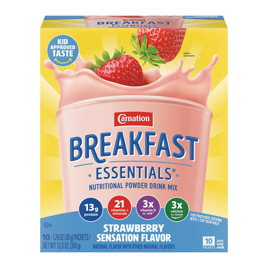Carnation Breakfast Essentials strawberry instant breakfast drink mix in a glass, showcasing the creamy pink beverage with a straw.