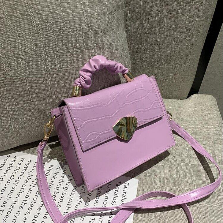 BACKUPMYFILESNOW® women's designer crossbody handbag with a stylish stone pattern and adjustable strap, perfect for everyday use.