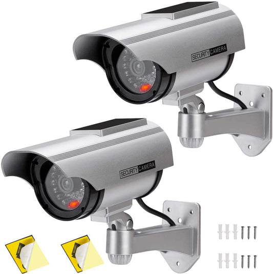 Set of two silver solar-powered dummy security cameras with red LED lights, simulating surveillance for home or business security.