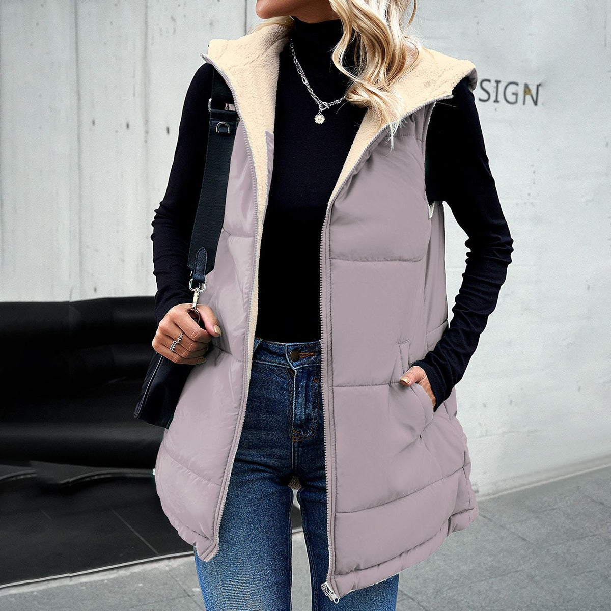 Women's mid-length hooded cotton winter vest with pockets, zipper, and fluffy warm lining