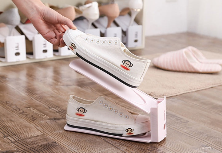 Shoe storage rack with multiple shelves for organizing footwear