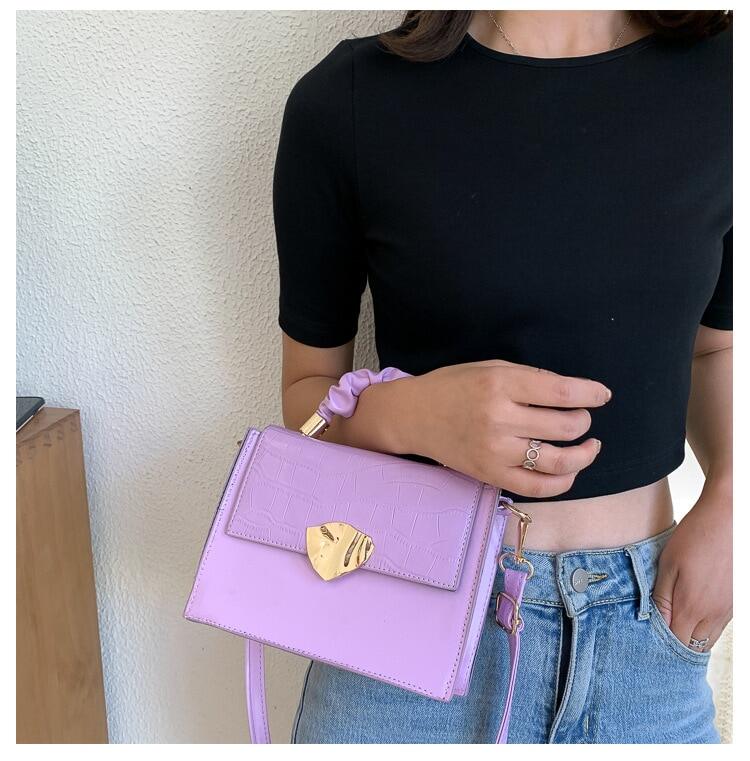 BACKUPMYFILESNOW® women's designer crossbody handbag with a stylish stone pattern and compact design.