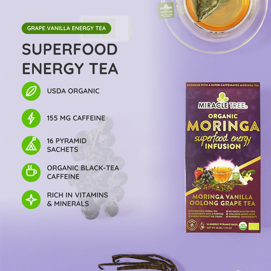 Miracle Tree Organic Moringa Energy Tea with vanilla, oolong, and grape flavors in a tea bag with fresh leaves and brewed tea.