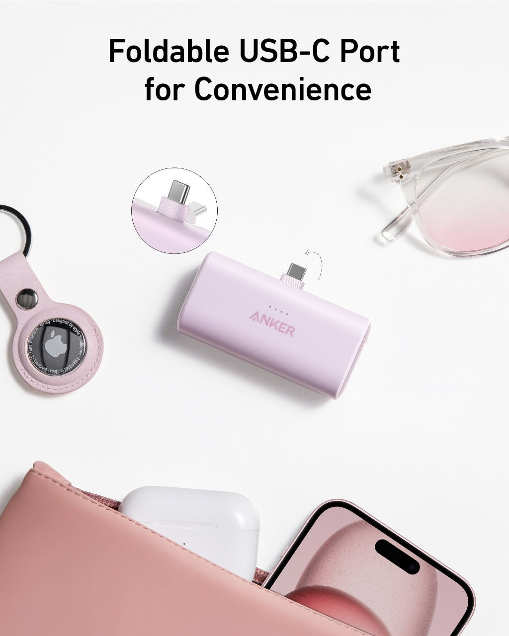 Anker Nano 22.5W power bank with built-in USB-C connector, compact portable charging device on a white background.