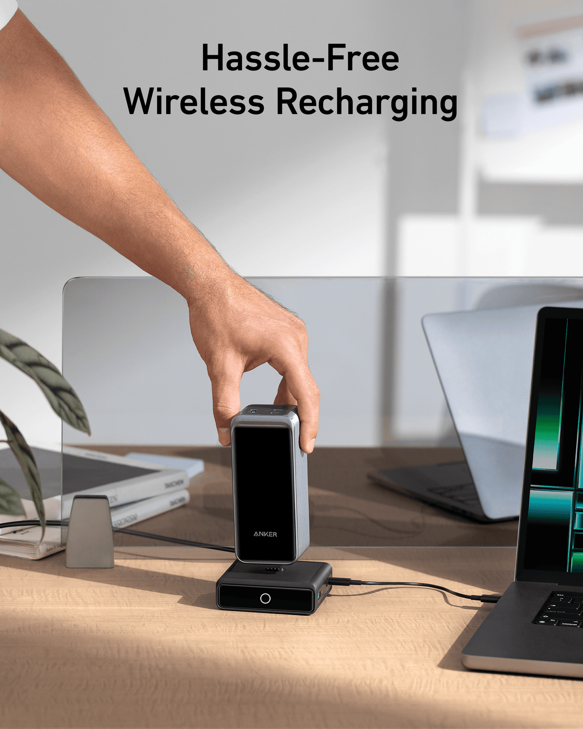 Anker 100W charging base connected to Anker Prime Power Bank for fast, reliable power delivery with a sleek design.