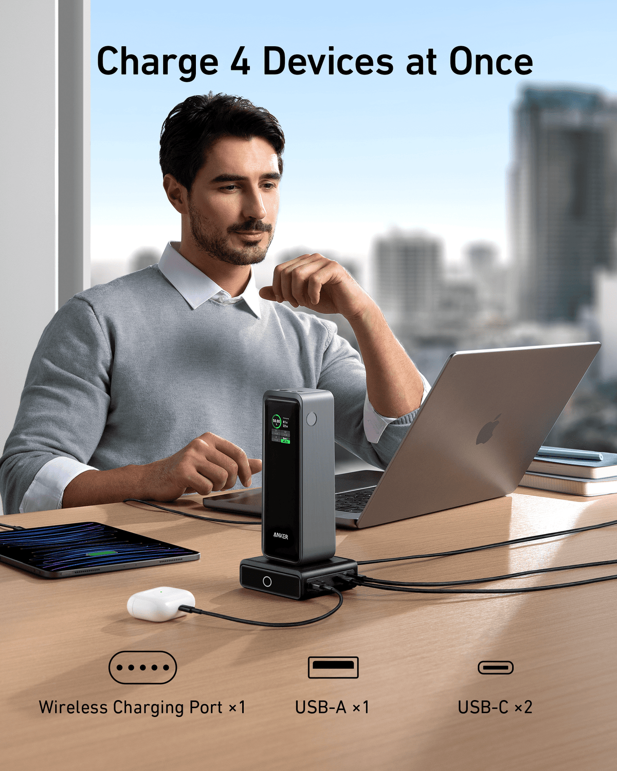 Anker 100W charging base for Anker Prime Power Bank, compact design with multiple charging ports, black plastic finish.