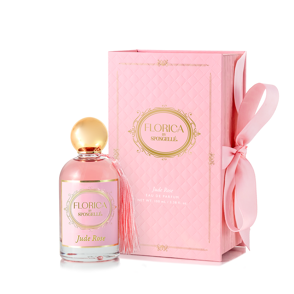Spongellé Sweet Gesture Jude Rose 3-piece bath gift set with floral bath sponges and skincare products arranged together.