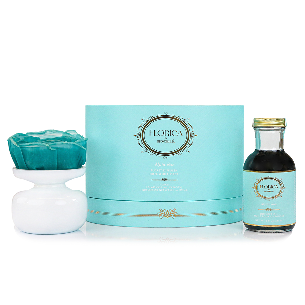 Spongellé Mystic Rose Floret Diffuser in a glass bottle, featuring delicate rose-shaped fragrance flowers for home scent.