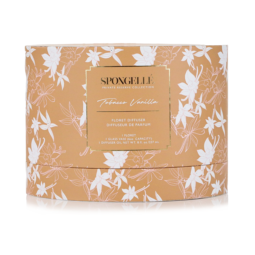 Private Reserve Tobacco Vanilla home fragrance diffuser by Spongellé with sleek glass bottle and reed sticks for aromatic scent diffusion.