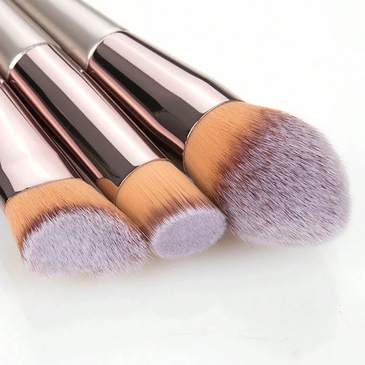 Blushimmer 14-piece synthetic makeup brush set with foundation, powder, concealer, eyeshadow, and blush brushes, displayed on a white background.