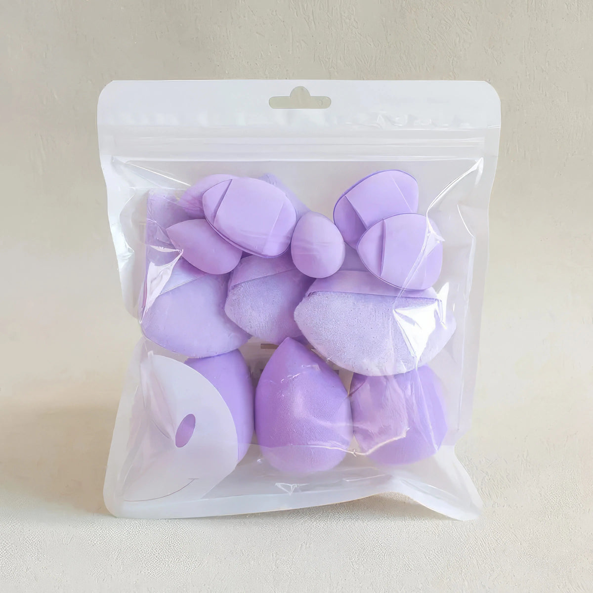 12-piece purple makeup sponge set by Blushimmer with latex-free beauty blenders for smooth, flawless foundation application