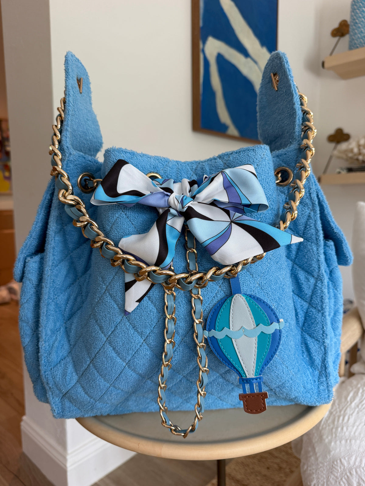 Medium Sky Blue Bayshore Bucket by BEACH HAUS, showing its round shape and vibrant color for beach or pool use.