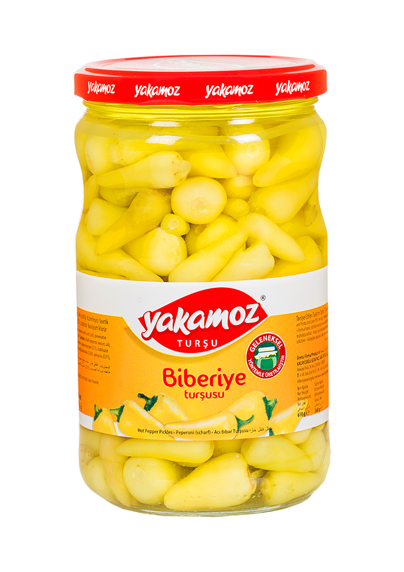 Glass jar of Yakamoz Hot Baby Pepper Pickles by S101, featuring vibrant red baby peppers and fresh herbs inside.