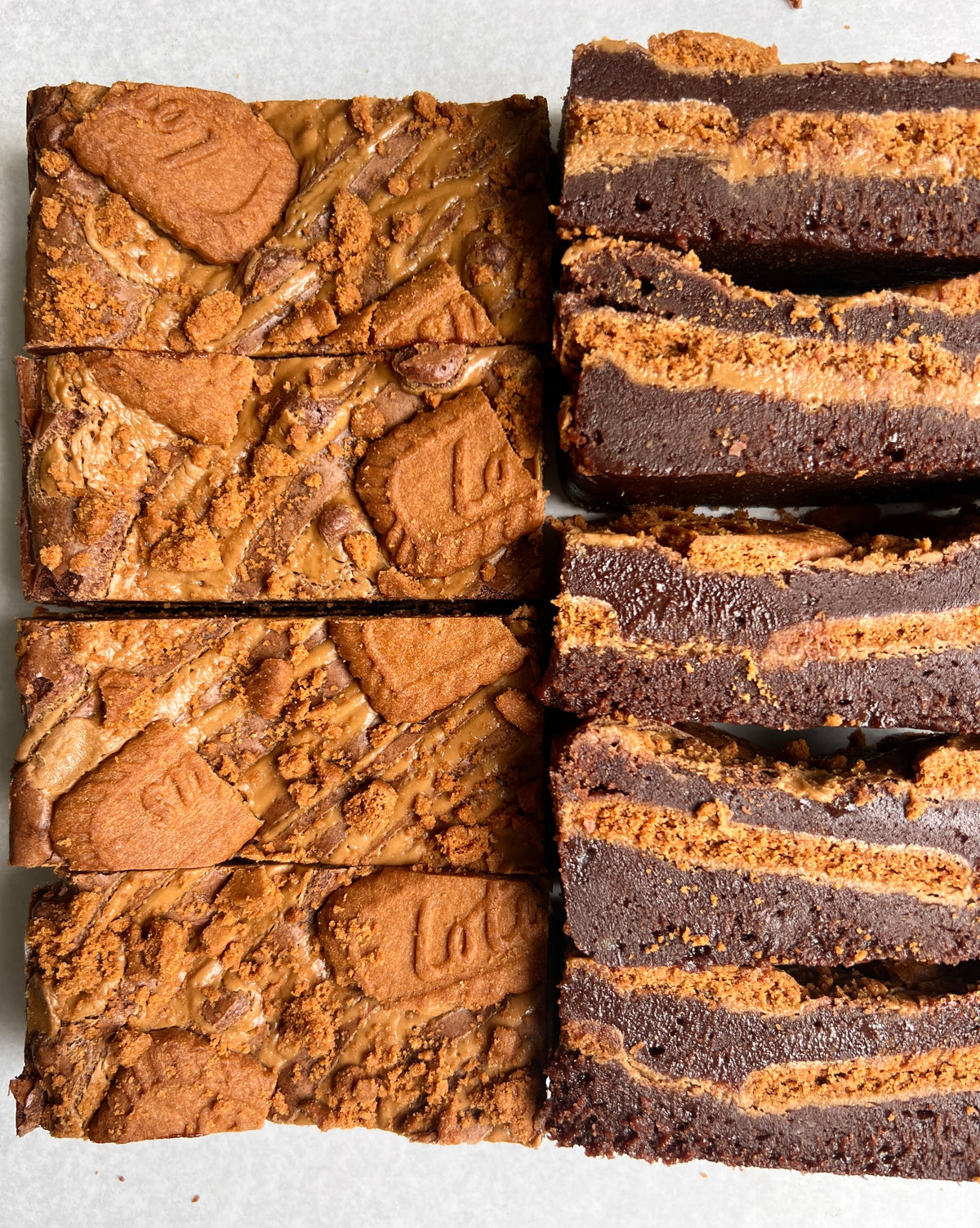 Let's Get Baked artisan Biscoff brownie cake with a rich, fudgy texture and swirls of Biscoff spread on top.