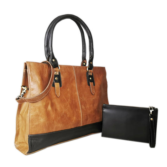 GoodHides Signature 17-inch leather laptop bag in copper with sturdy handles and sleek design.