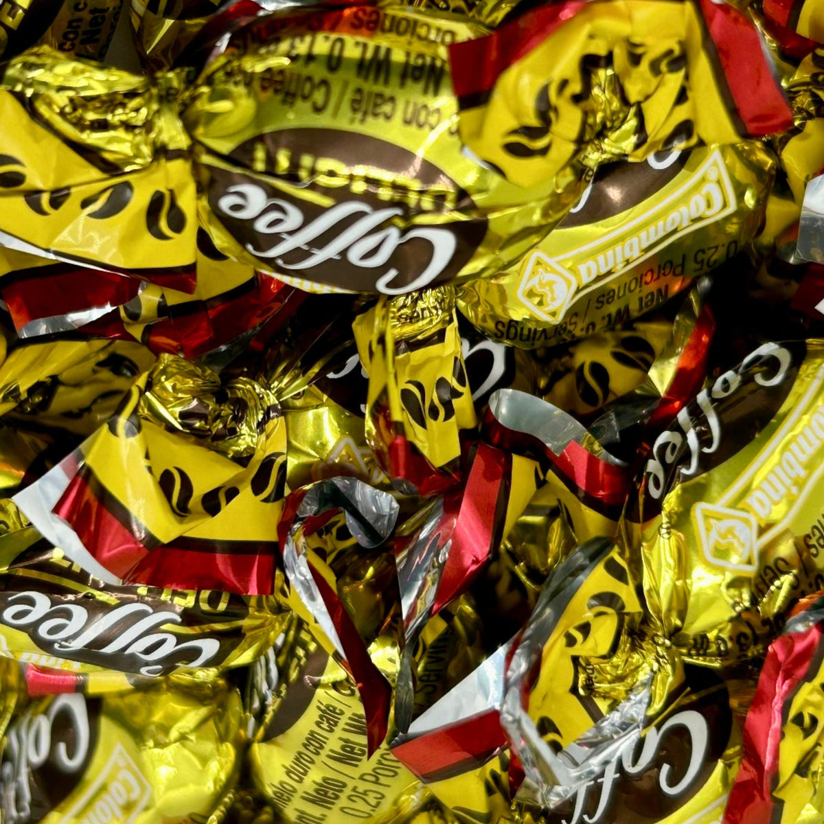 Colombina Coffee Delight coffee-flavored hard candies in a bulk value bag, showing shiny, individually wrapped candies from Candy In Bulk.